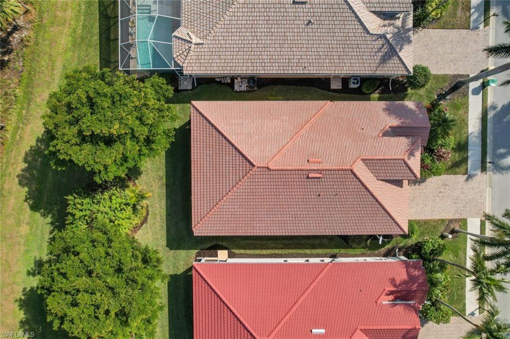 14439 Manchester Drive Naples, FL 34114 - Photo 18 of 47 an aerial view of a house with a yard