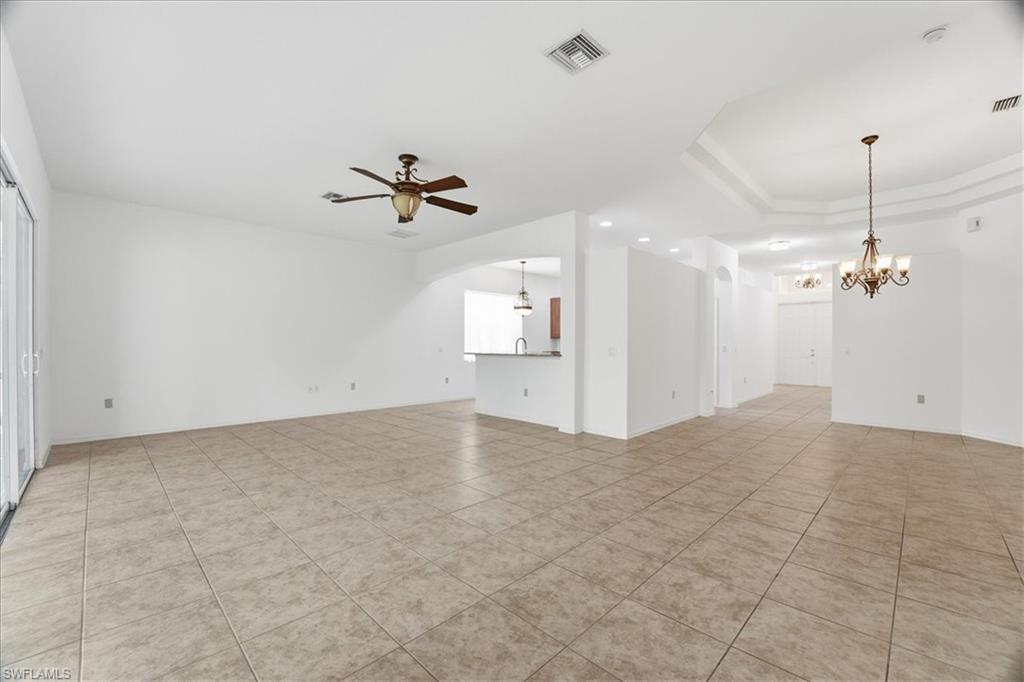 14439 Manchester Drive Naples, FL 34114 - Photo 2 of 47 a view of a livingroom with a ceiling fan
