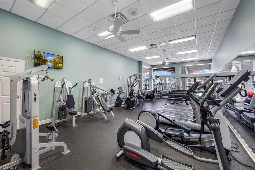 14439 Manchester Drive Naples, FL 34114 - Photo 31 of 47 a view of a room with gym equipment