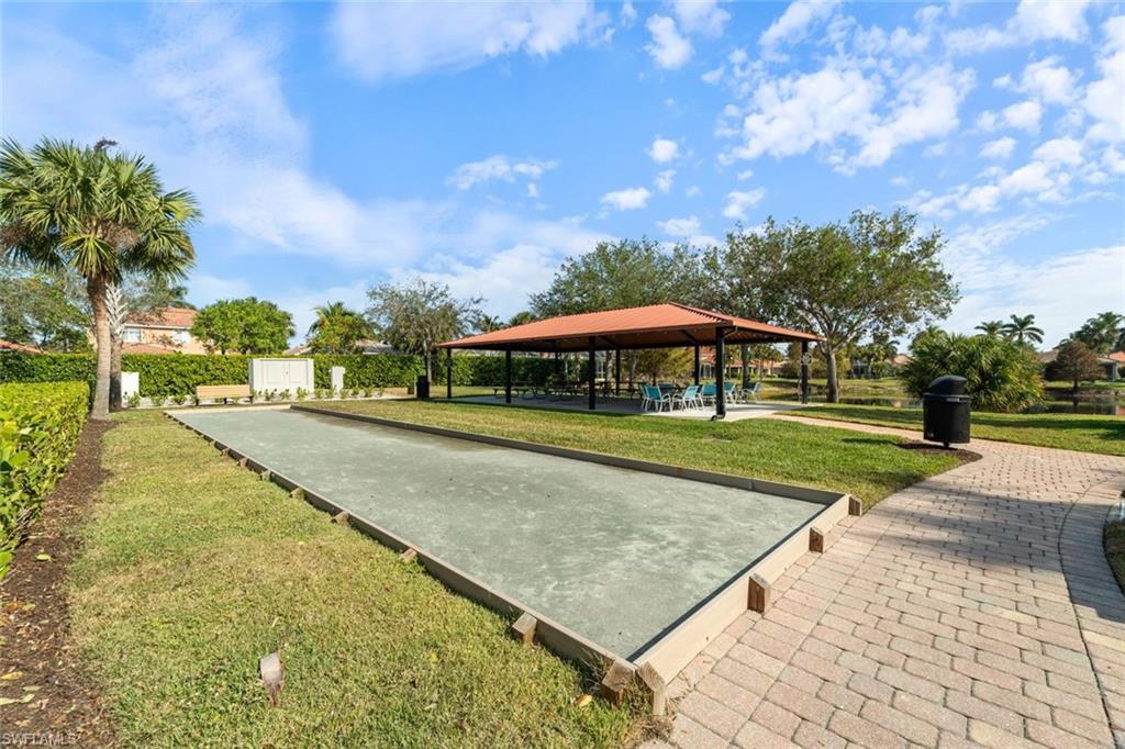 14439 Manchester Drive Naples, FL 34114 - Photo 33 of 47 a view of an outdoor space and a yard