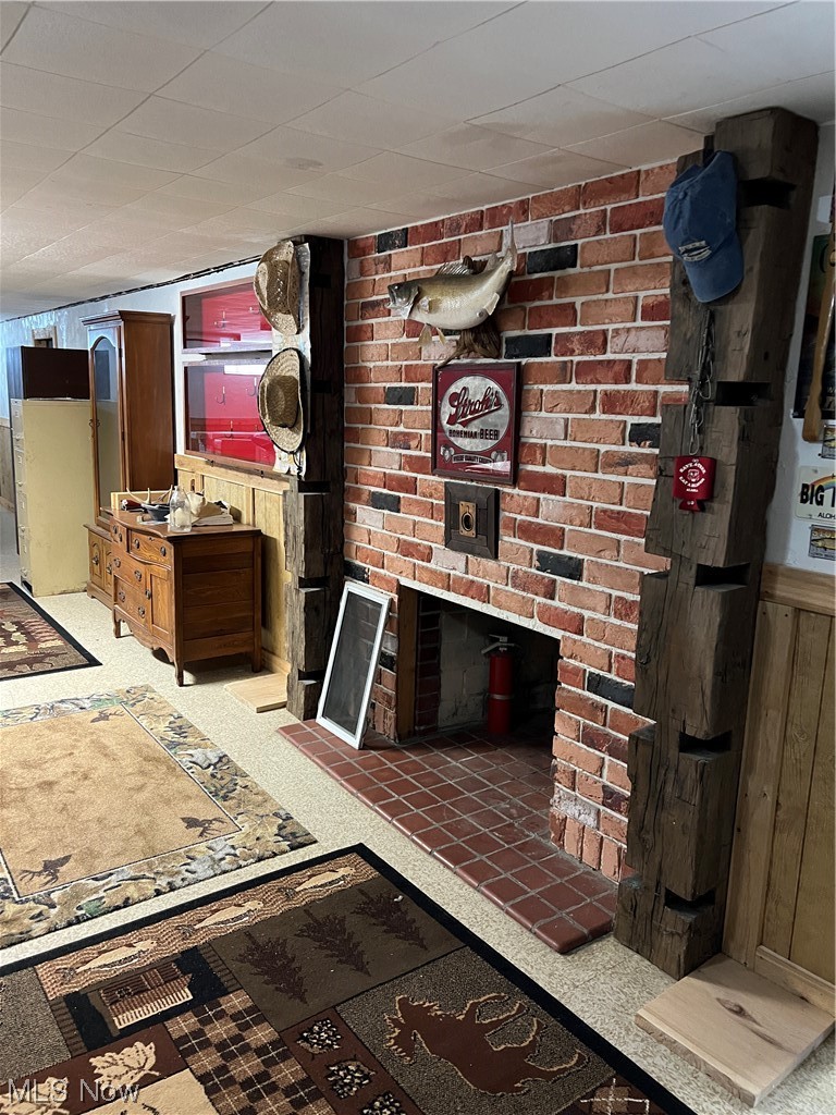 3130 Lake Road West Ashtabula, OH 44004 - Photo 25 of 35 Lower level family room 39 x 17. Wood burning fireplace.