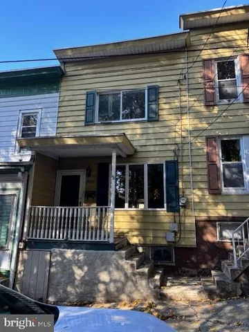 a view of a house with street