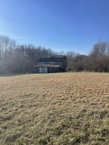 a view of a house with a large space