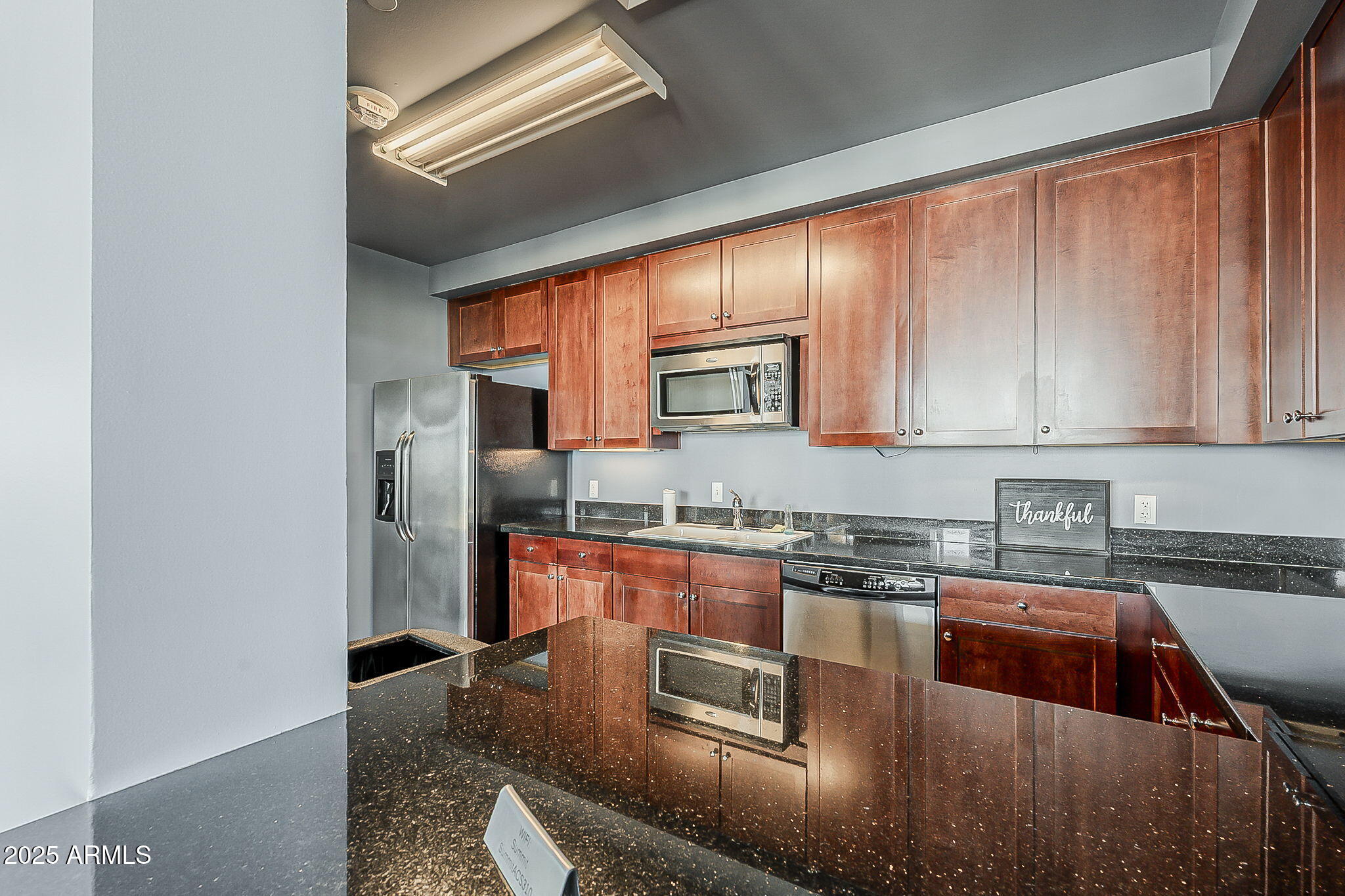 310 South 4th Street, Unit 1601 Phoenix, AZ 85004 - Photo 39 of 54 Event or Meeting Room/Kitchen