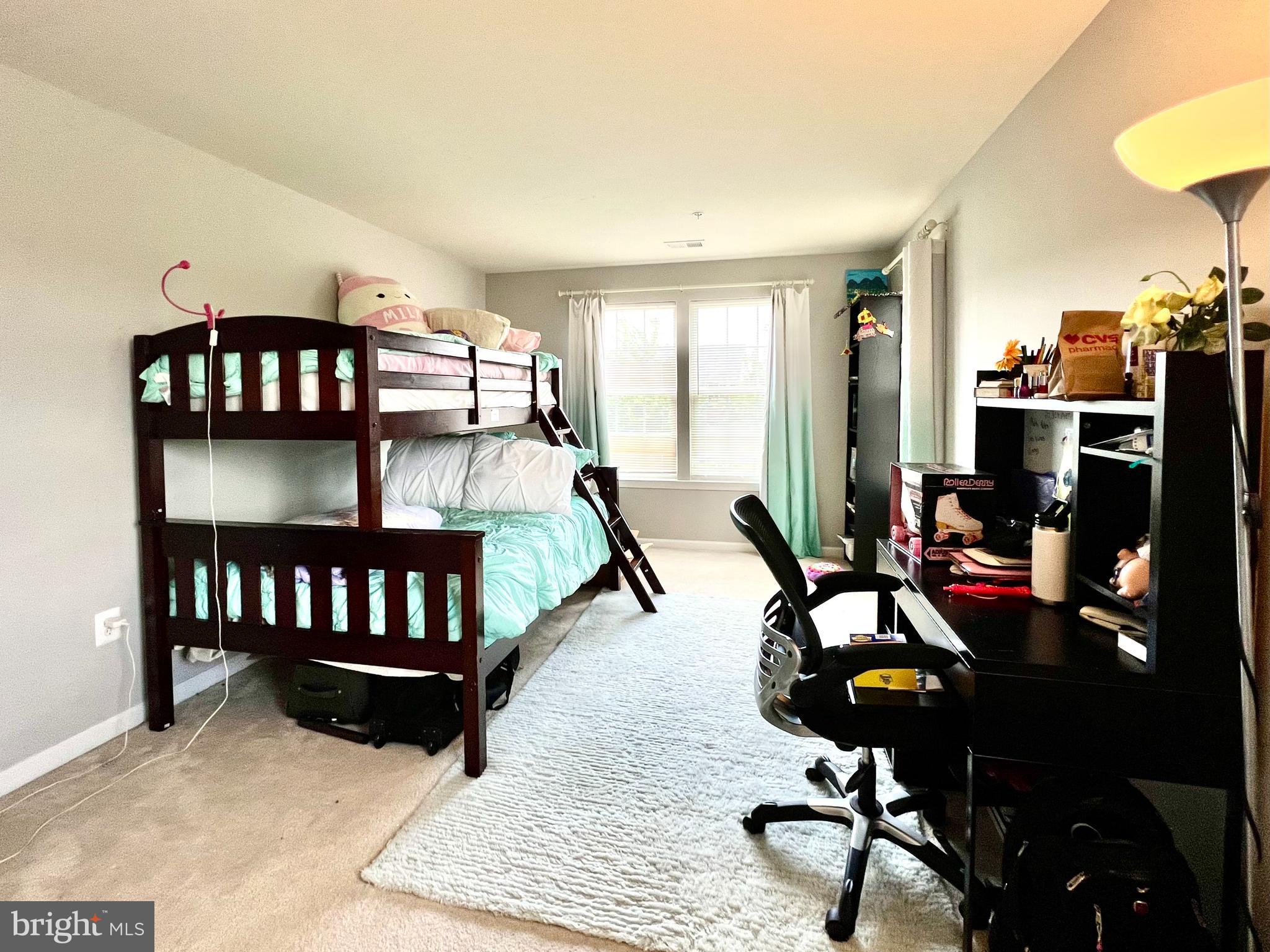 13501 Oaklands Manor Drive Laurel, MD 20708 - Photo 34 of 46 a bedroom with furniture or air conditioner and a window