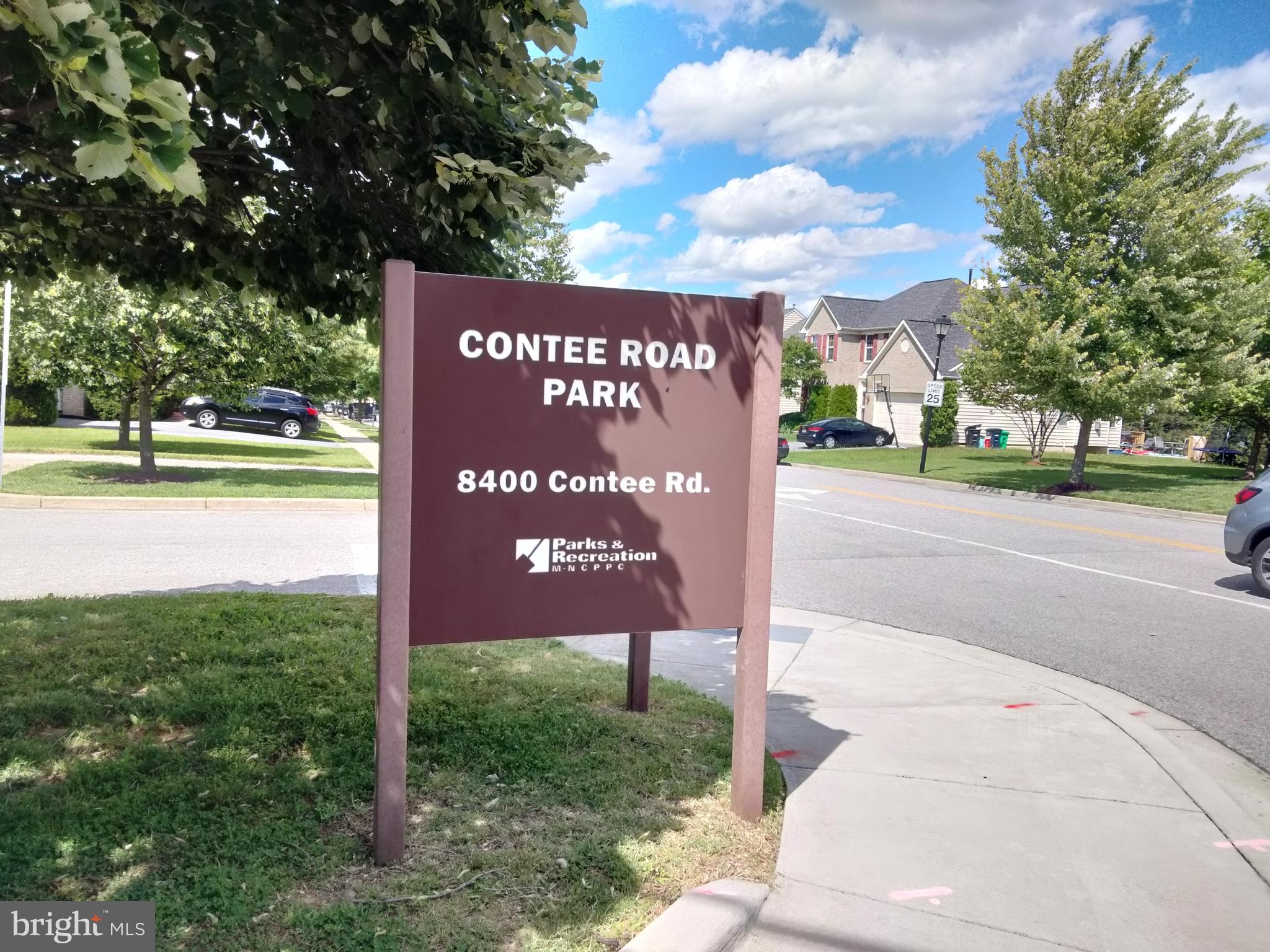 13501 Oaklands Manor Drive Laurel, MD 20708 - Photo 43 of 46 a sign on the side of the road