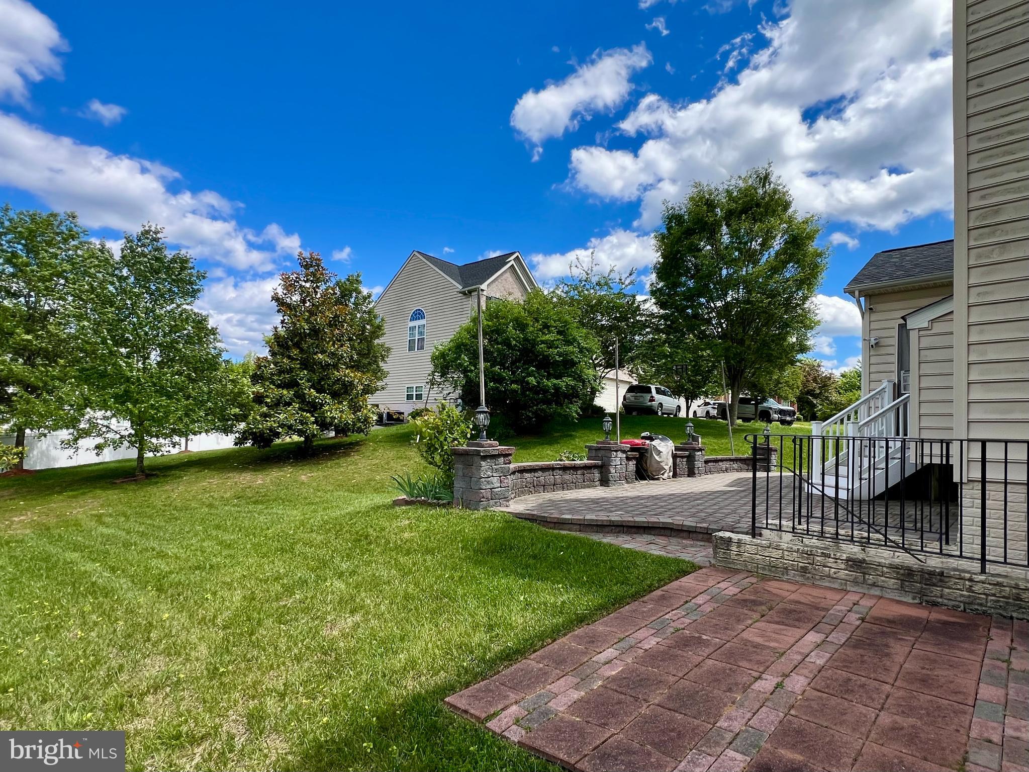 13501 Oaklands Manor Drive Laurel, MD 20708 - Photo 7 of 46 a view of a garden with sitting area