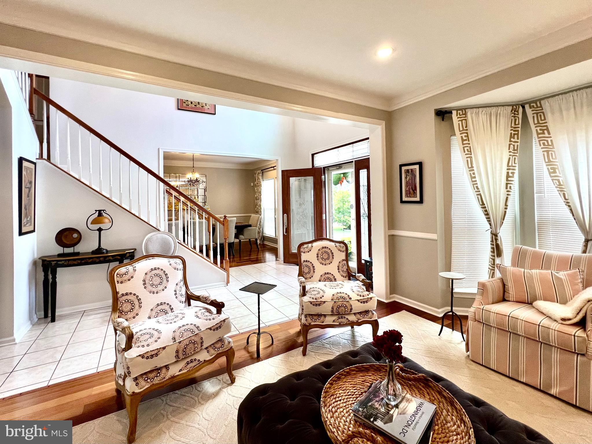 13501 Oaklands Manor Drive Laurel, MD 20708 - Photo 10 of 46 a living room with furniture and wooden floor