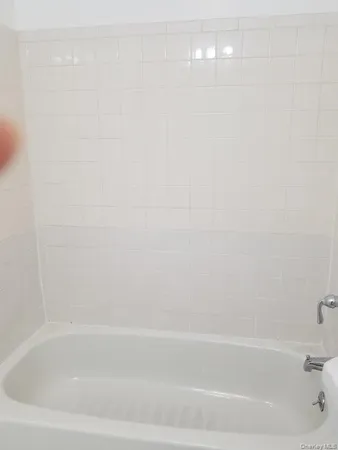 a bathroom with a bathtub