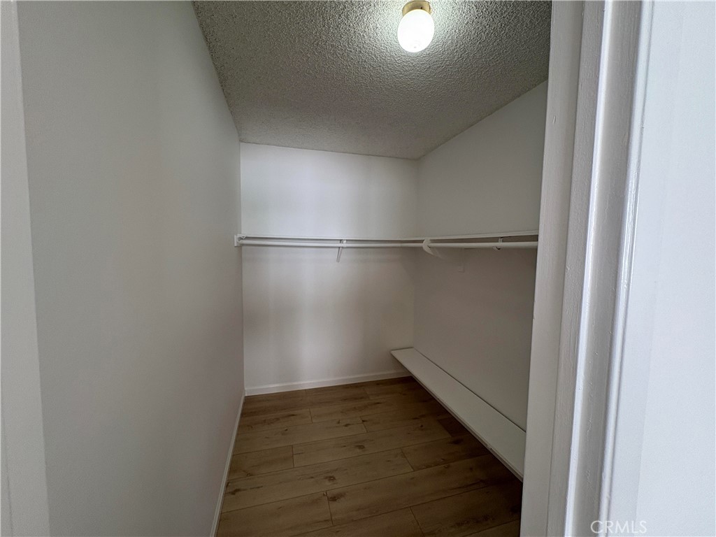 17061 Evergreen Circle, Unit D Huntington Beach, CA 92647 - Photo 11 of 18 a view of an empty walk in closet