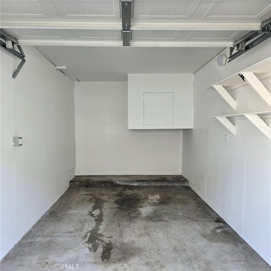 17061 Evergreen Circle, Unit D Huntington Beach, CA 92647 - Photo 12 of 18 a view of a room with rack on the wall