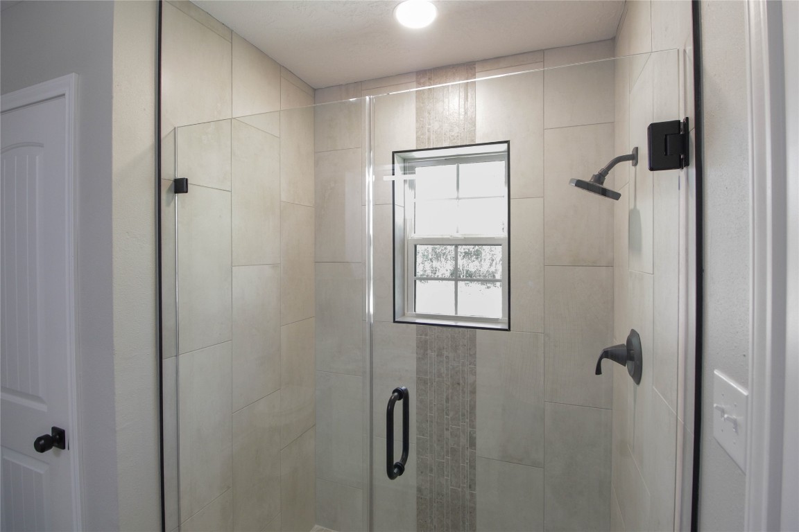 115 Corry Jones Livingston, TX 77351 - Photo 15 of 31 a bathroom with a shower