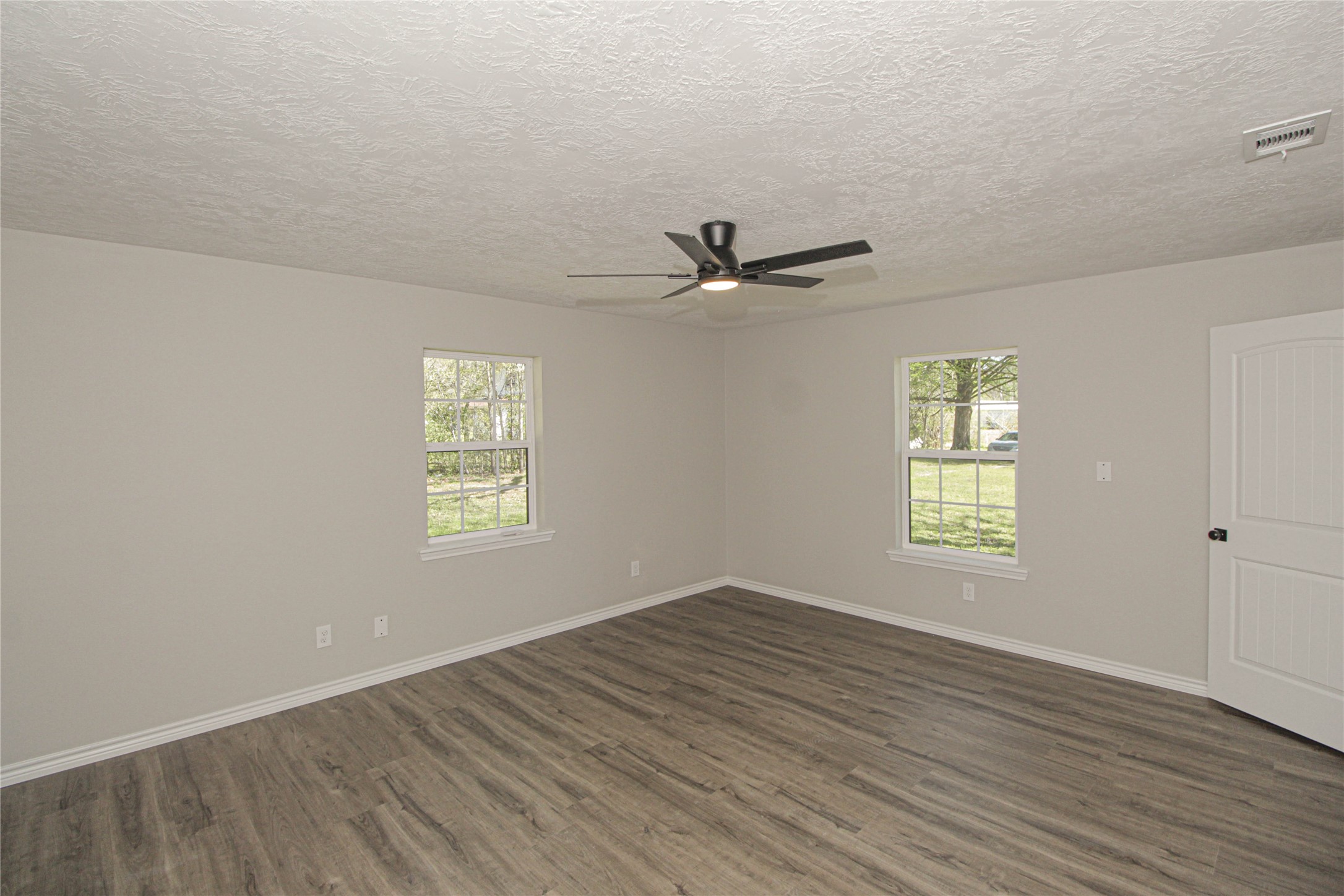 115 Corry Jones Livingston, TX 77351 - Photo 17 of 31 a view of an empty room with a window