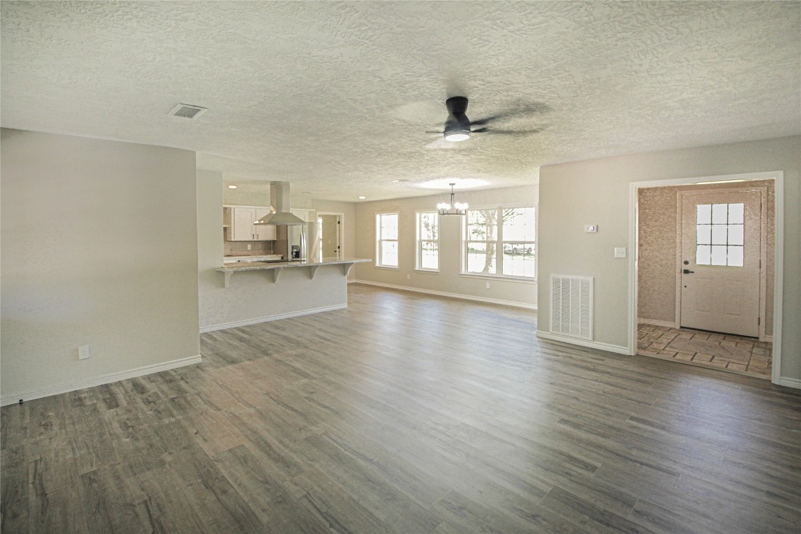 115 Corry Jones Livingston, TX 77351 - Photo 23 of 31 a view of an empty room with window and wooden floor