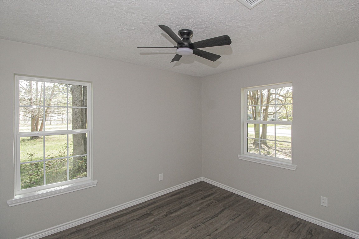 115 Corry Jones Livingston, TX 77351 - Photo 26 of 31 a view of a big room with wooden floor and windows