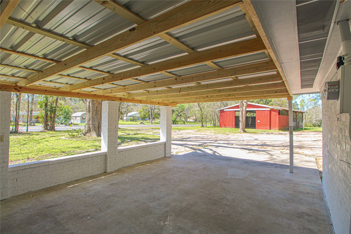 115 Corry Jones Livingston, TX 77351 - Photo 31 of 31 a view of water heater room with wooden floor