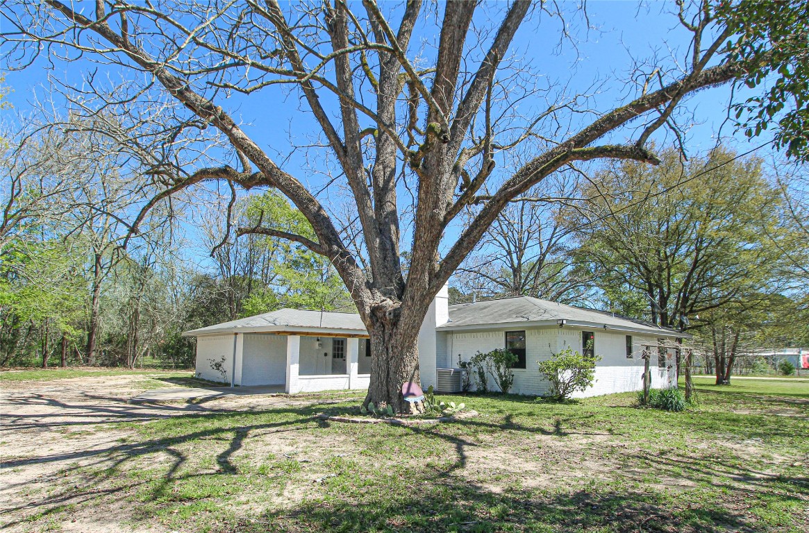 115 Corry Jones Livingston, TX 77351 - Photo 5 of 31 a view of a house with a yard