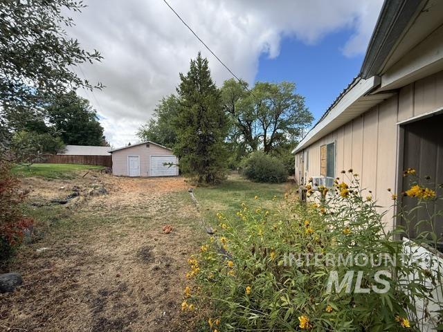 555 Cemetery Road Cambridge, ID 83610 - Photo 22 of 41 Detached garage with two roll-up doors and a pedestrian door