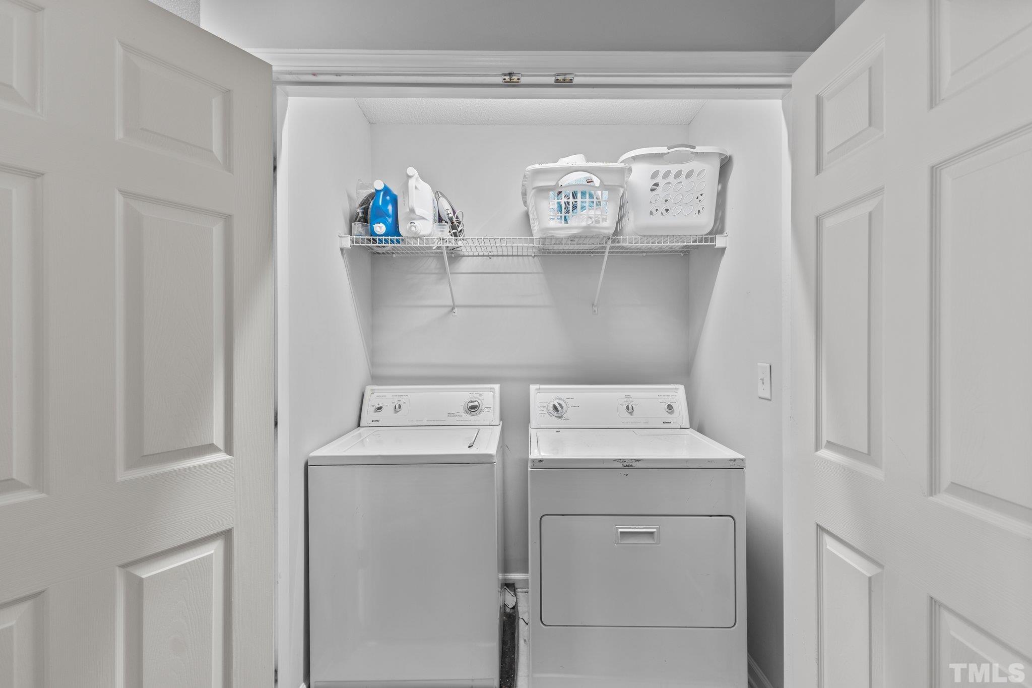 3366 Bridgeville Road Raleigh, NC 27610 - Photo 24 of 37 a utility room with dryer and washer