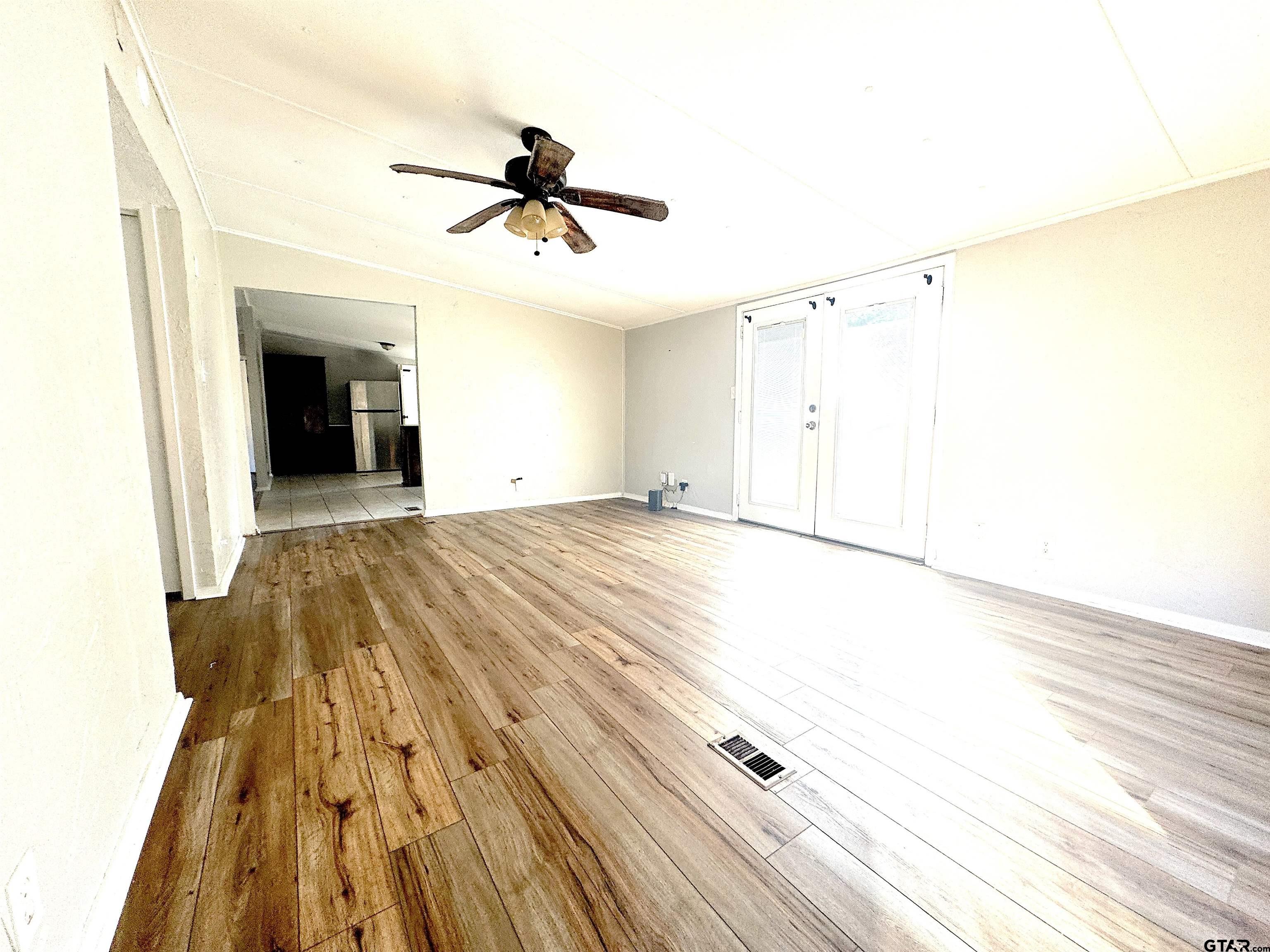 1391 San Saba Road Mount Vernon, TX 75457 - Photo 7 of 13 a view of a livingroom with a fireplace