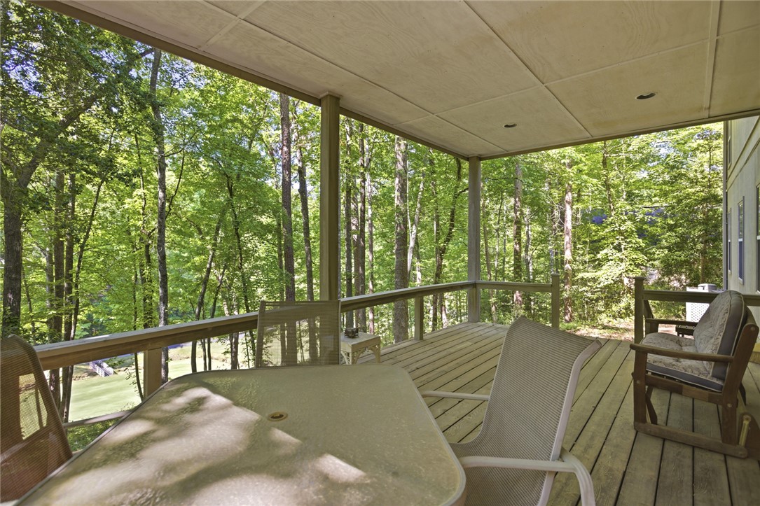 6 Tradewinds Way Salem, SC 29676 - Photo 29 of 50 Enjoy tranquil woodland views from this inviting, spacious covered deck.