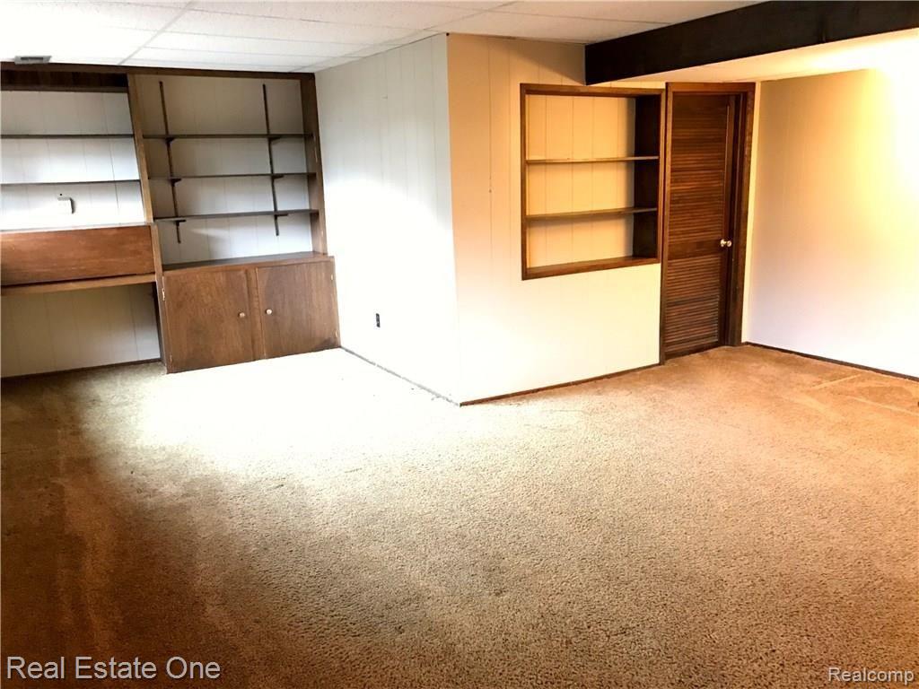 321 Willow Grove Lane Rochester, MI 48307 - Photo 11 of 27 FINISHED LOWER LEVEL WITH LOTS OF BUILT-INS