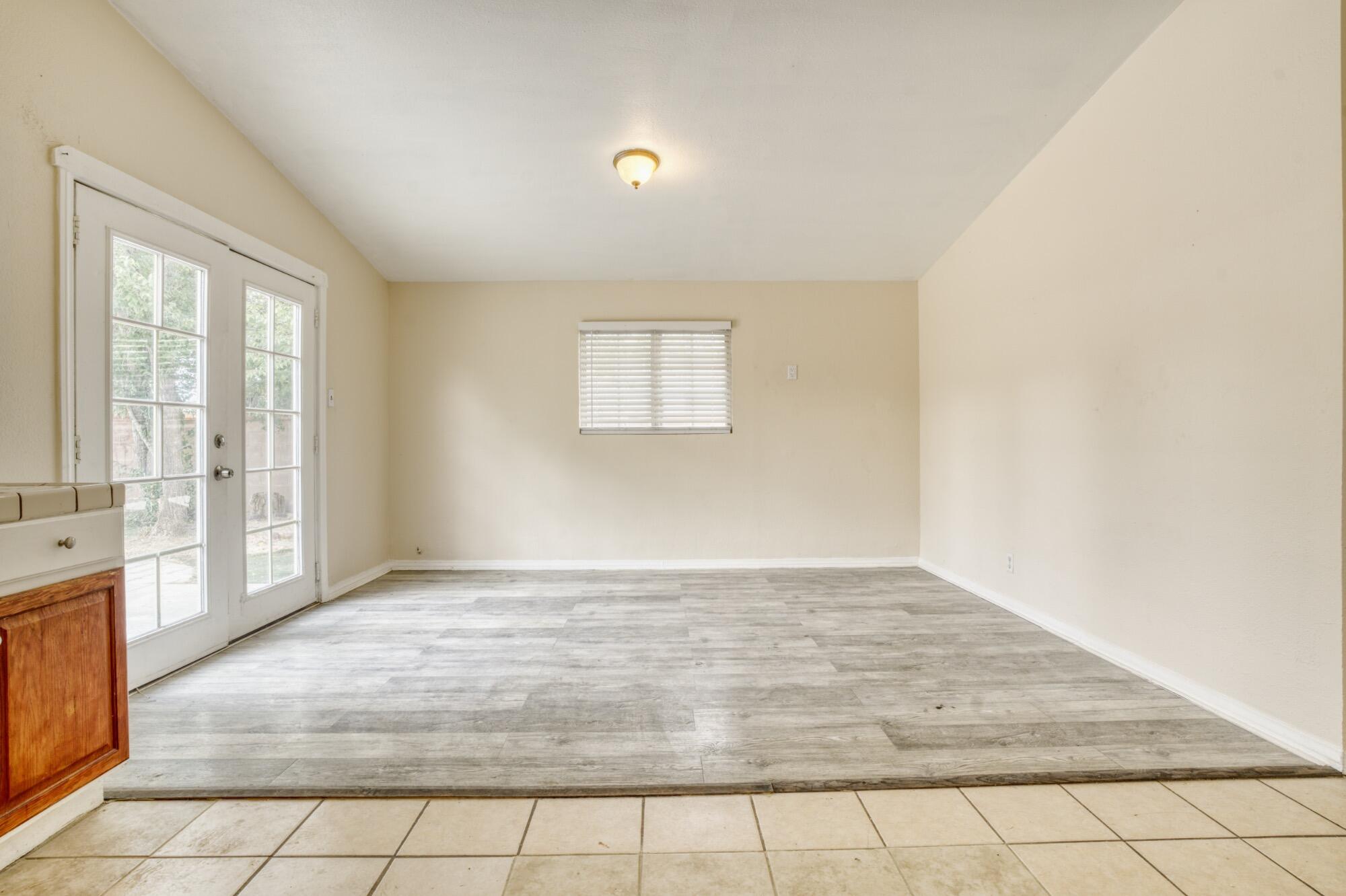 2047 West Lingard Street Lancaster, CA 93536 - Photo 8 of 15 a view of an empty room and window