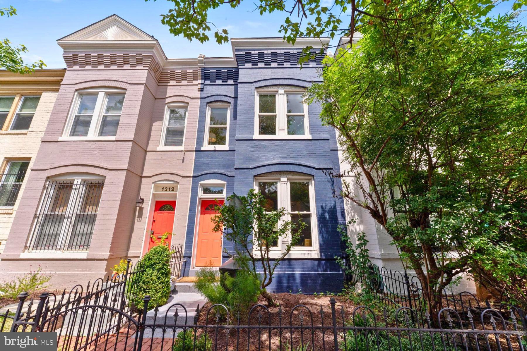 1314 C Street Southeast Washington, DC 20003 - Photo 1 of 30 front view of a brick house with a large windows