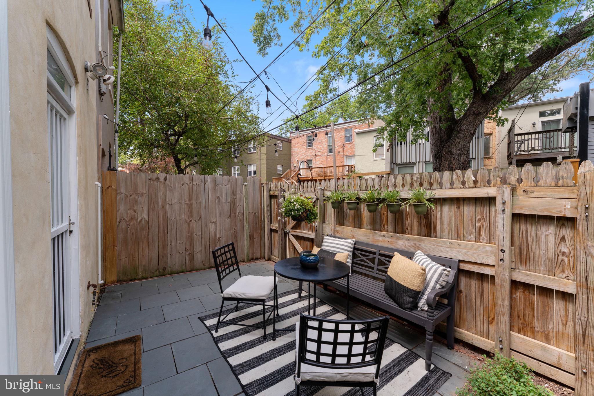 1314 C Street Southeast Washington, DC 20003 - Photo 11 of 30 a view of balcony with wooden floor and outdoor seating
