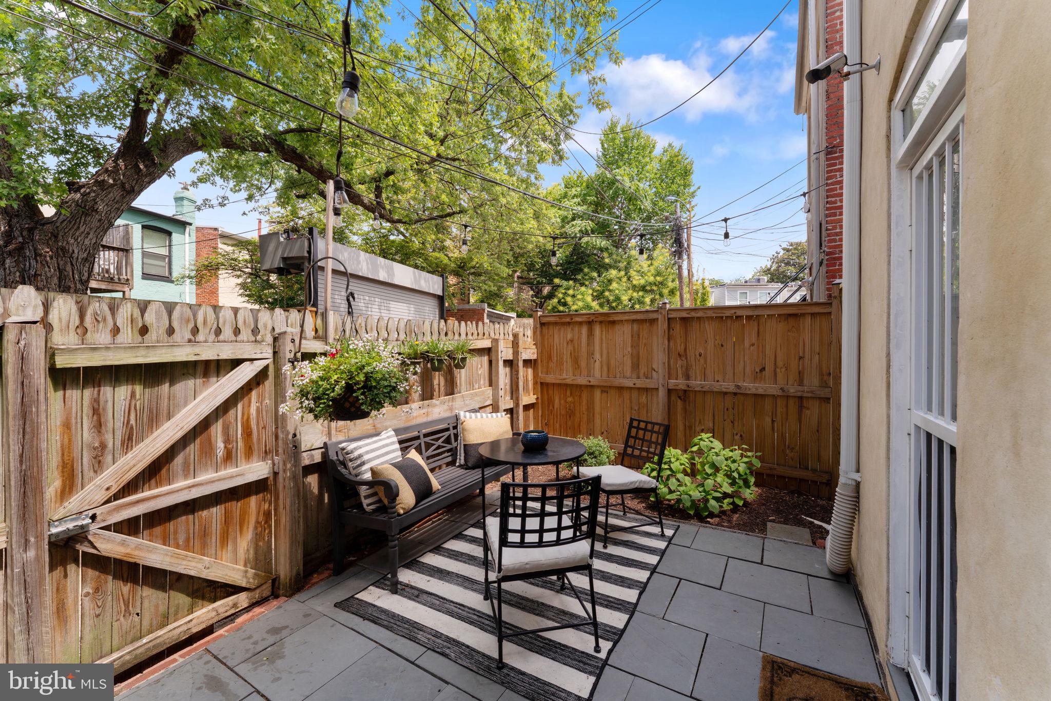 1314 C Street Southeast Washington, DC 20003 - Photo 12 of 30 a view of a backyard with sitting area