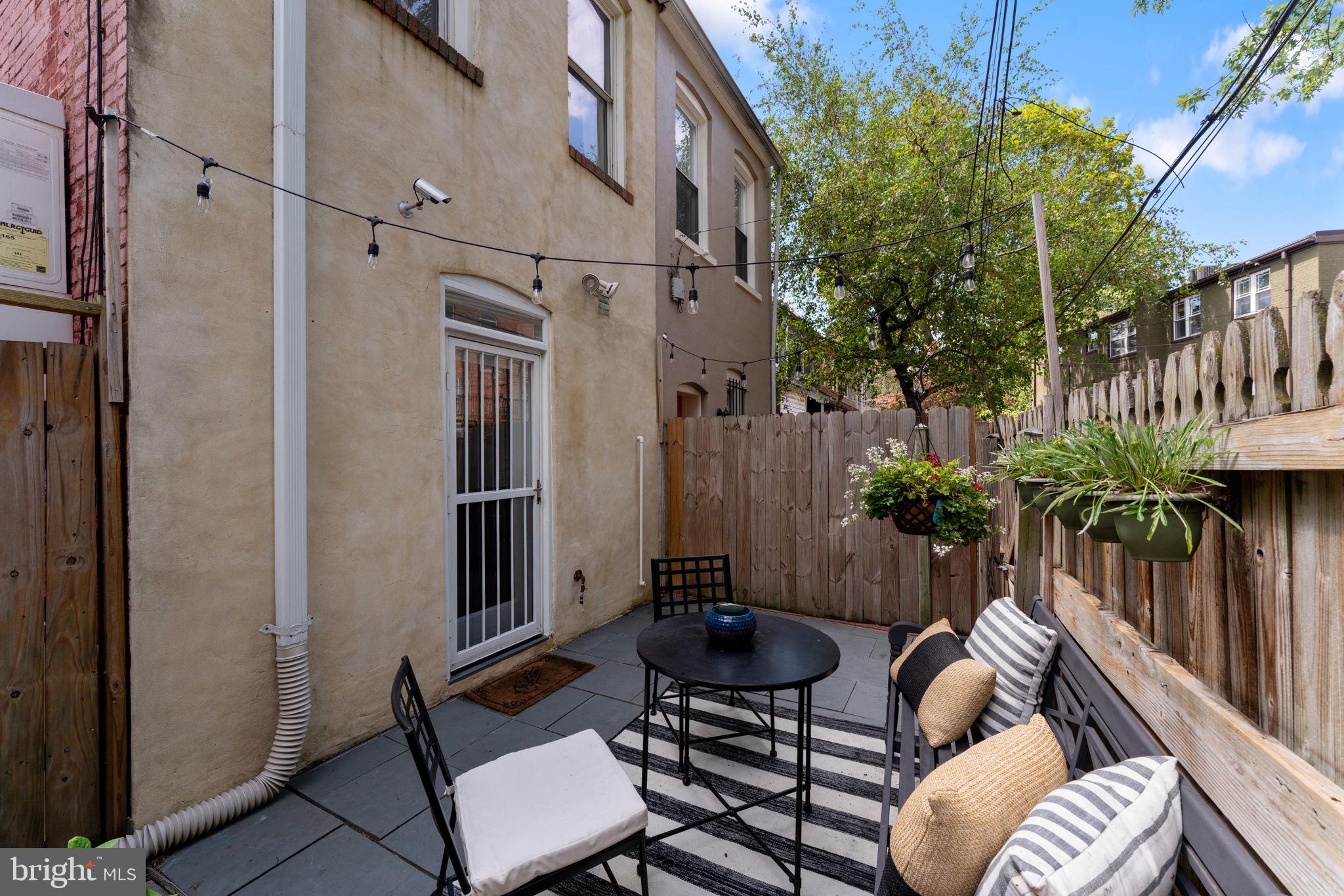 1314 C Street Southeast Washington, DC 20003 - Photo 13 of 30 a view of balcony with furniture and a potted plant