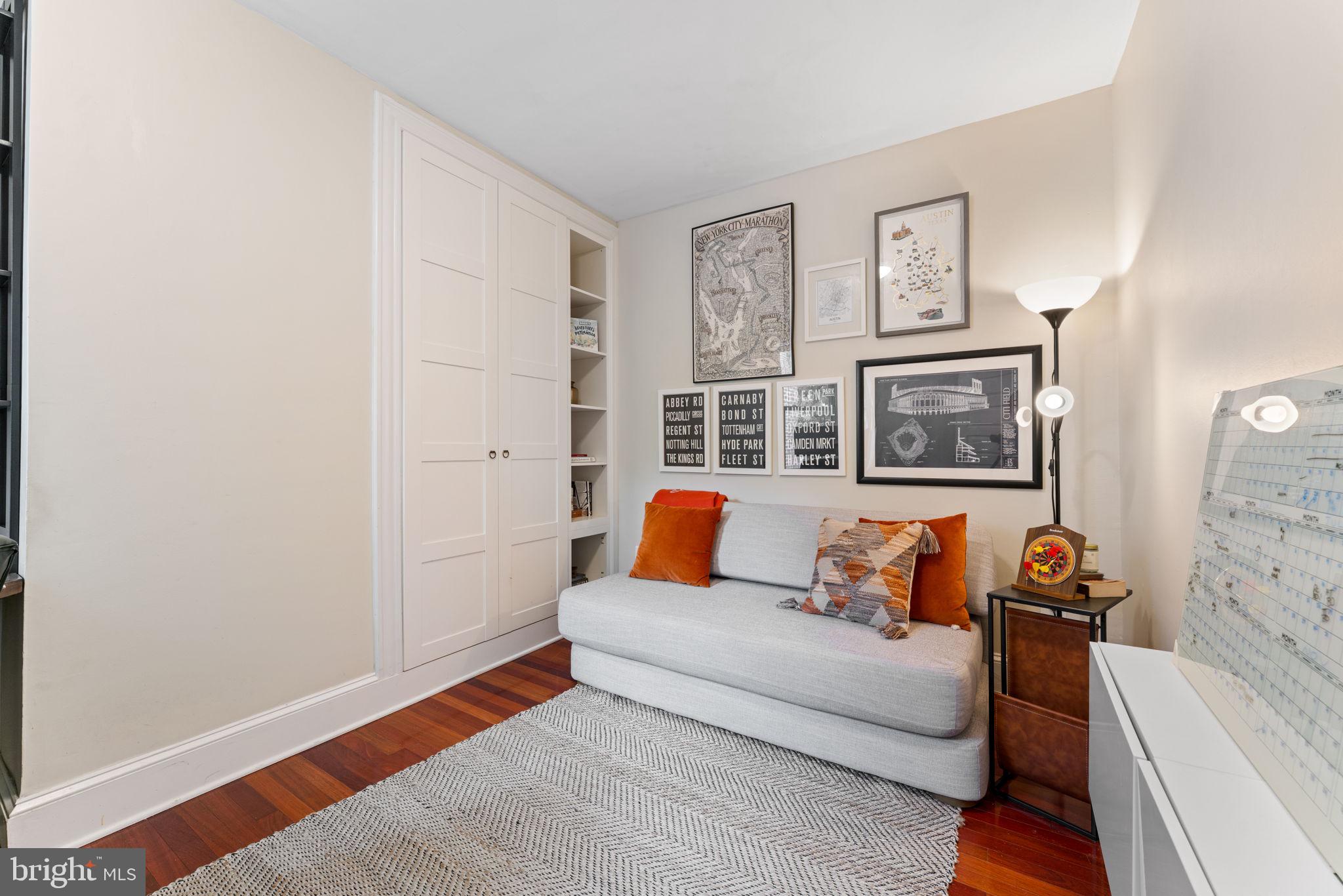 1314 C Street Southeast Washington, DC 20003 - Photo 21 of 30 a bedroom with furniture and wooden floor