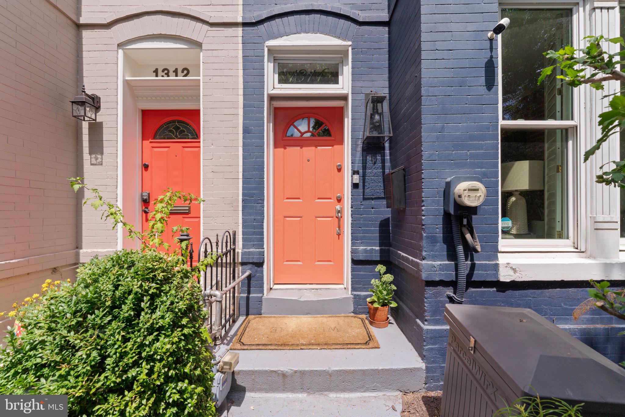 1314 C Street Southeast Washington, DC 20003 - Photo 28 of 30 a front view of a house with a garden