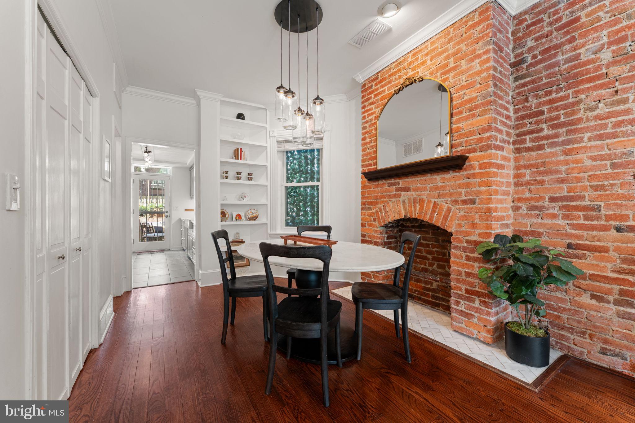 1314 C Street Southeast Washington, DC 20003 - Photo 6 of 30 a view of a dining room with furniture and wooden floor