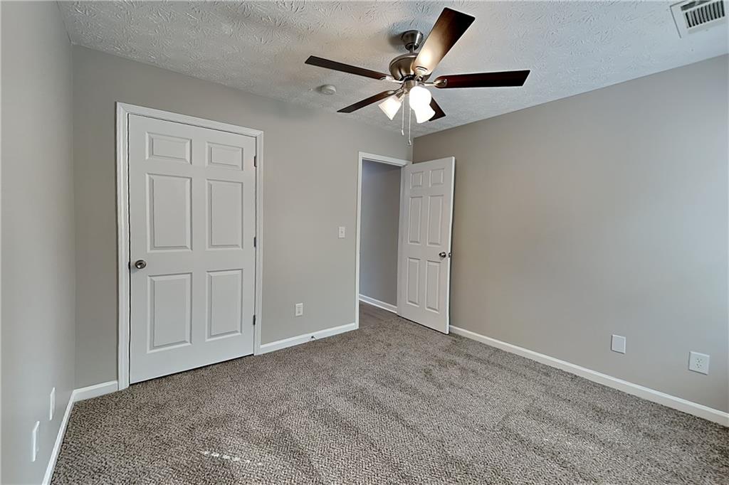6345 Aarons Way Flowery Branch, GA 30542 - Photo 10 of 19 a view of an empty room