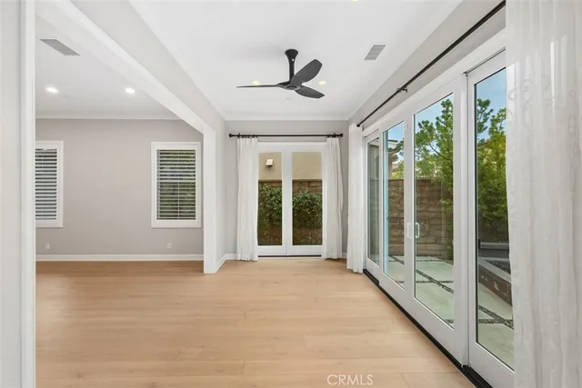 a view of an entryway with a floor to ceiling window