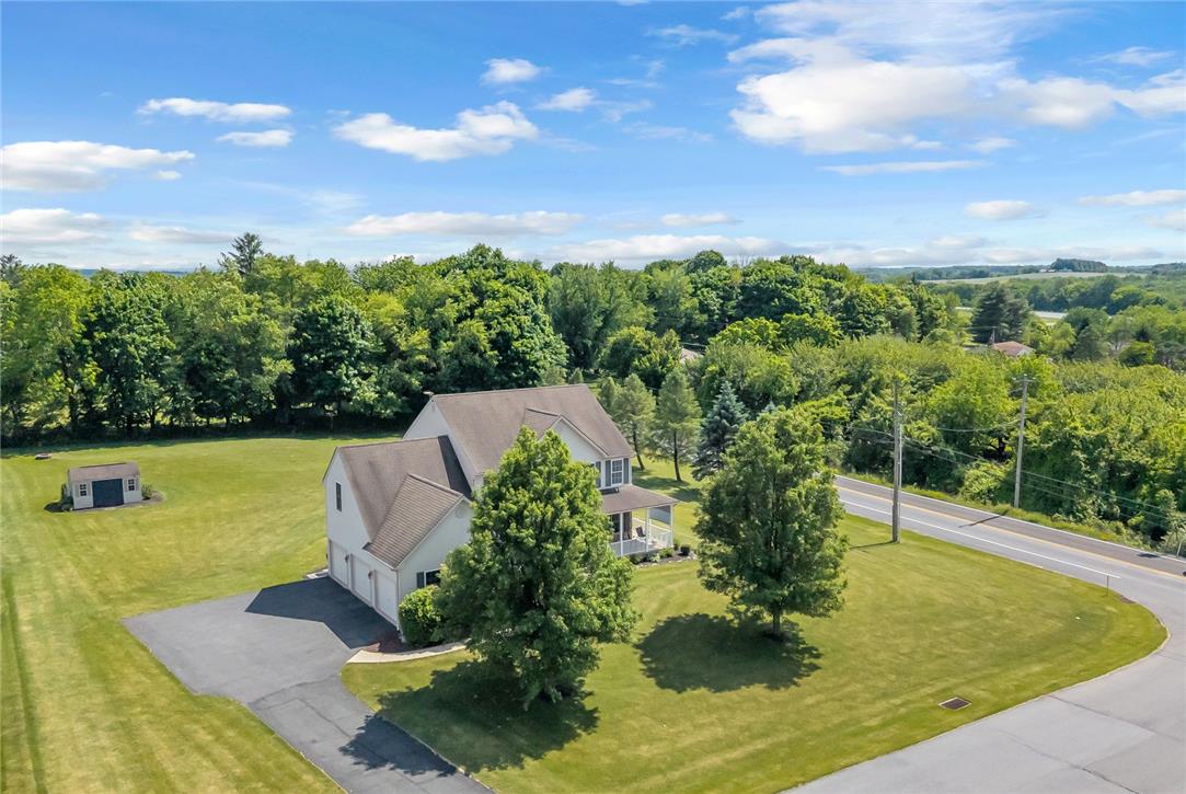 204 Bushkill Ridge Road Wind Gap, PA 18091 - Photo 2 of 48 Perched on a verdant lot, this charming residence offers expansive yard space and distant tree-lined views.