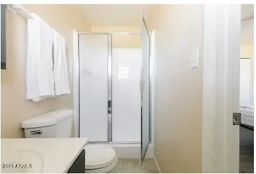 a bathroom with a shower curtain and a sink