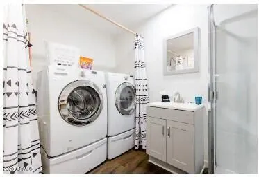 a utility room with dryer and washer