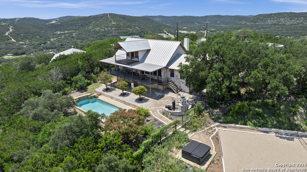 360 Bluebonnet Concan, TX 78838 - Photo 36 of 40 a view of a city from a lake