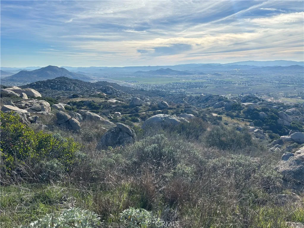 0 Gunther Road Romoland, CA 92585 - Photo 4 of 6 a view of a dry field with lots of bushes
