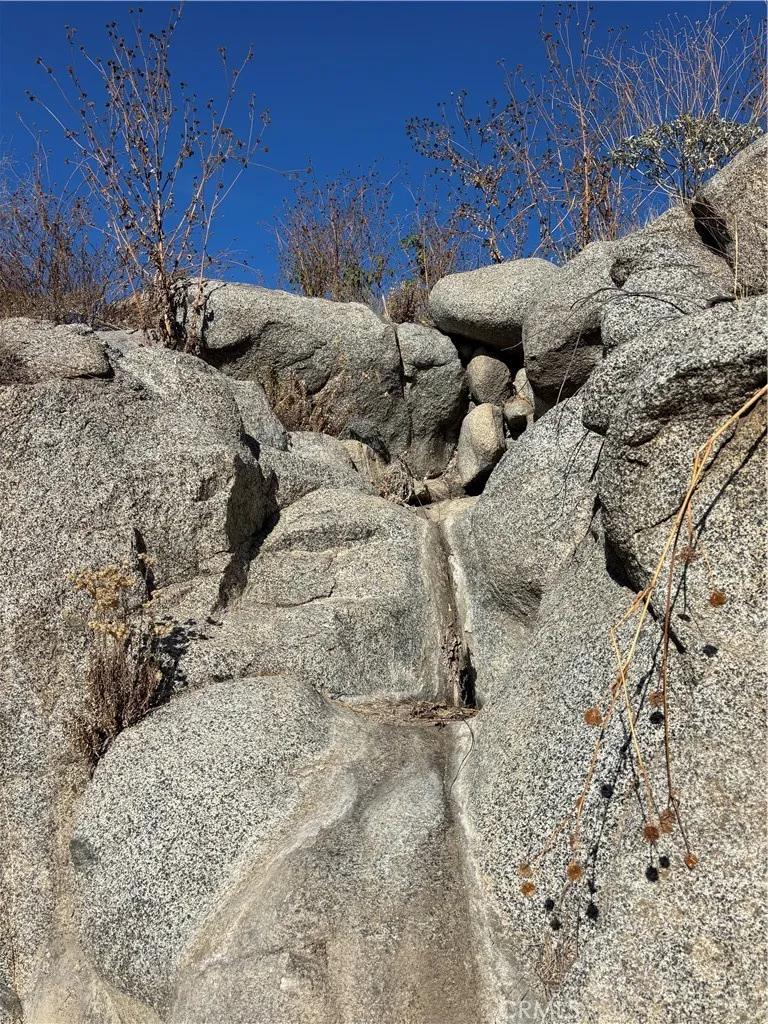 0 Gunther Road Romoland, CA 92585 - Photo 5 of 6 a view of a backyard of a house