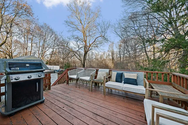 a outdoor view with sitting space and trees