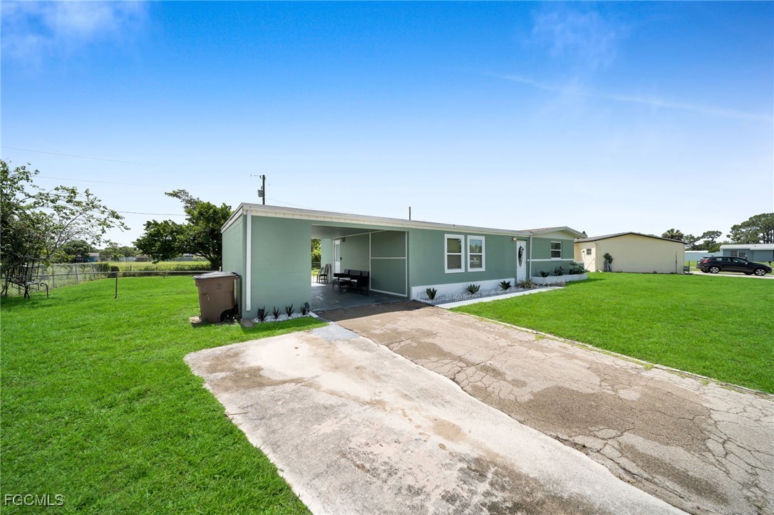 102 Oleander Road Lehigh Acres, FL 33936 - Photo 2 of 20