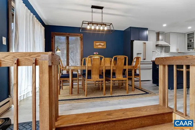 a kitchen with a stove and a refrigerator
