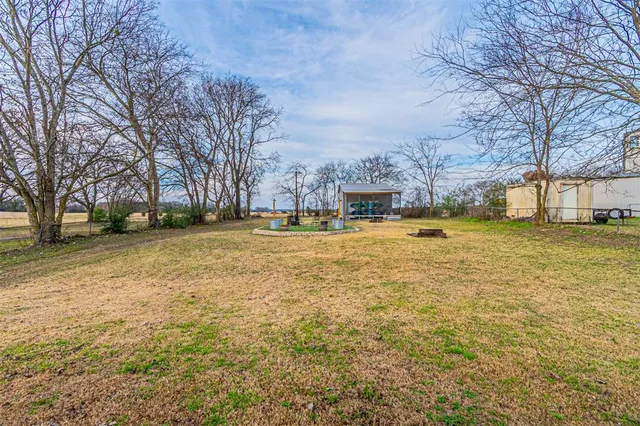 a view of yard with lake view