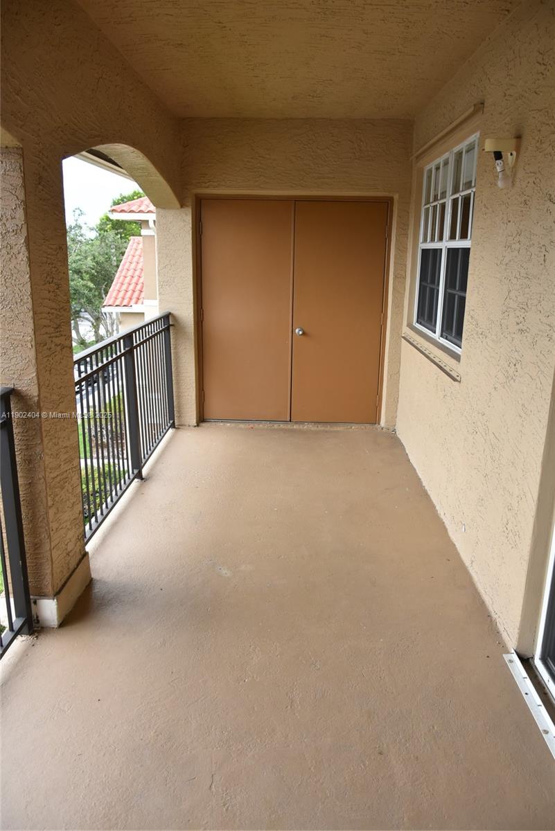 11701 Southwest 2nd Street, Unit 5305 Pembroke Pines, FL 33025 - Photo 13 of 27 a view of an empty room with a window