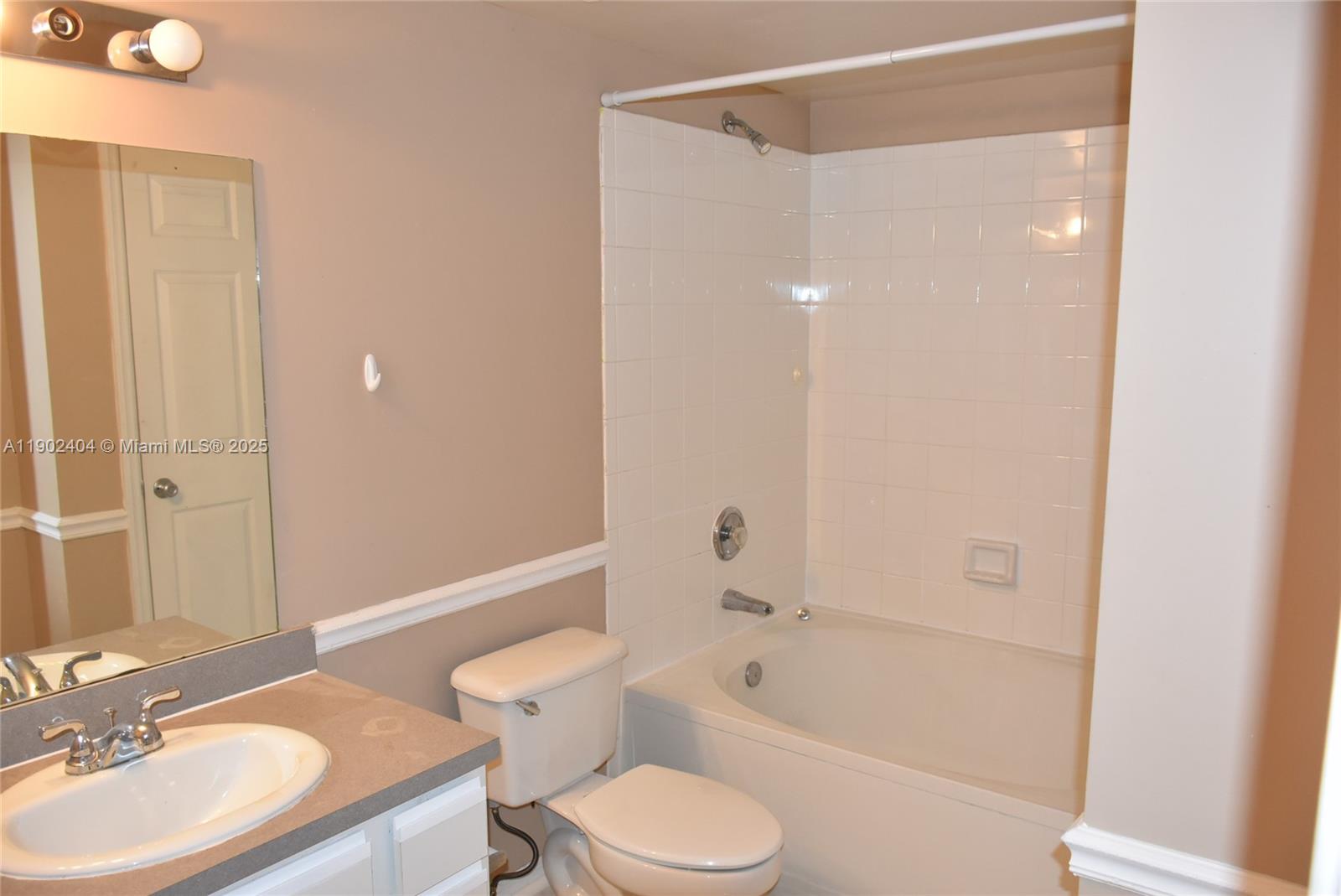 11701 Southwest 2nd Street, Unit 5305 Pembroke Pines, FL 33025 - Photo 21 of 27 a bathroom with a sink toilet and shower