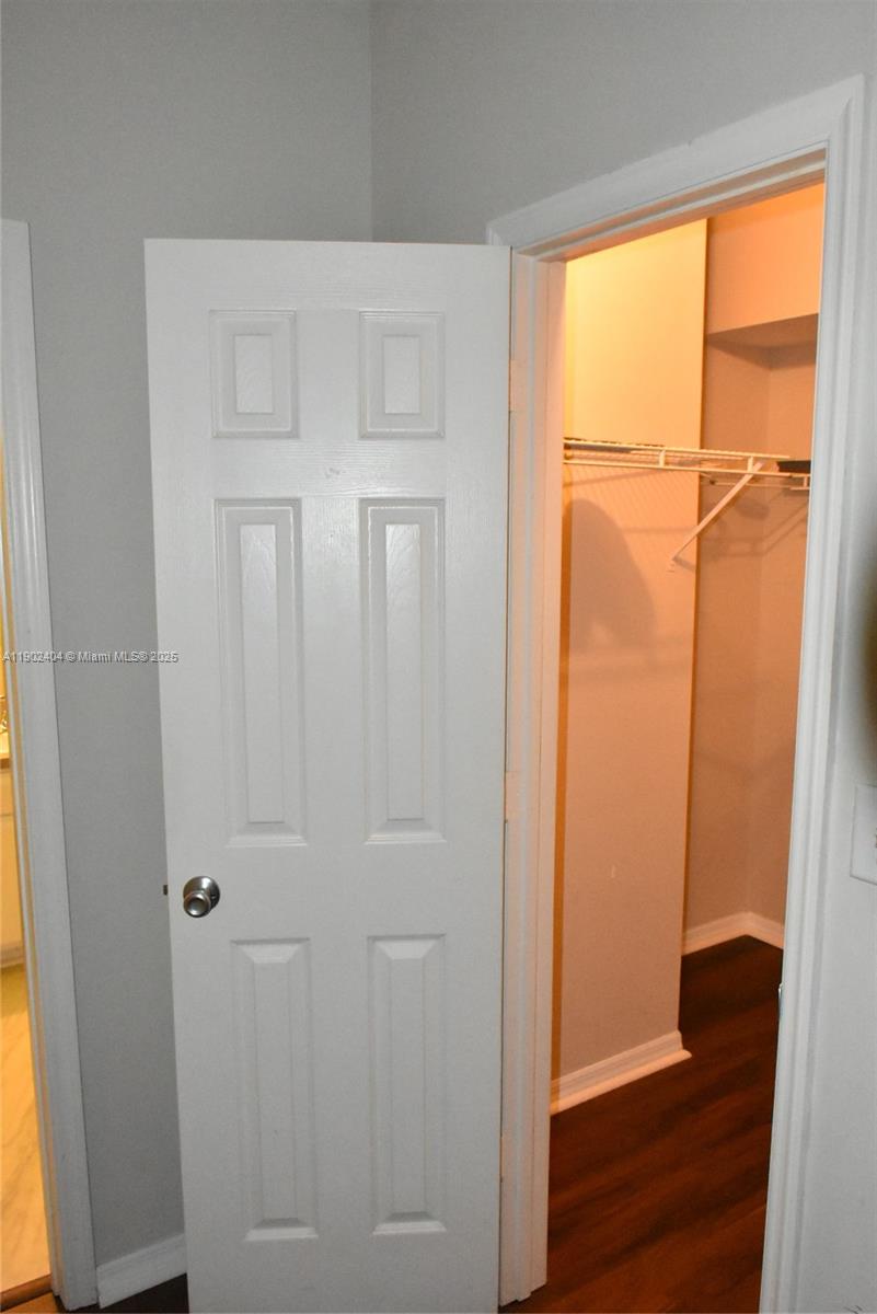 11701 Southwest 2nd Street, Unit 5305 Pembroke Pines, FL 33025 - Photo 25 of 27 a view of front door with wooden floor