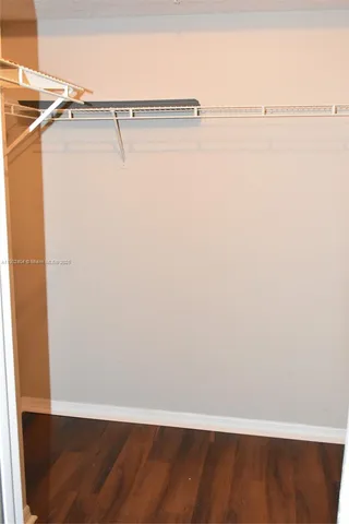 a view of a room with racks on the wall